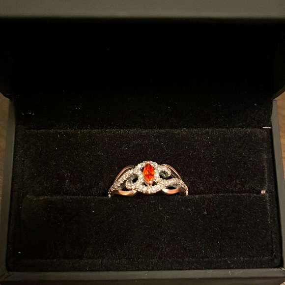 unknown Jewelry - Fashion ring with rose gold / diamond look at size of 6.